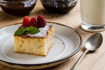 baked rice pudding with raspberry