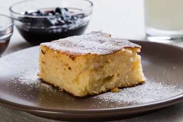 baked rice pudding with syrup - 115381560