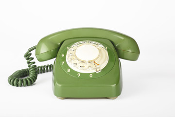 Green vintage phone on a white background