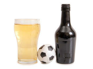 Glass beer mug and a ball on a white background