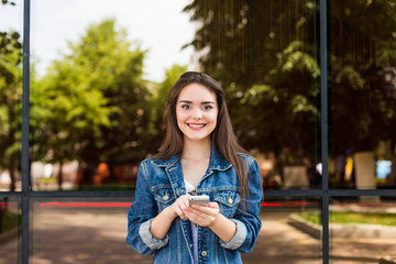 Young girl talk phone on the street