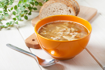 Traditional polish tripe soup with vegetables.