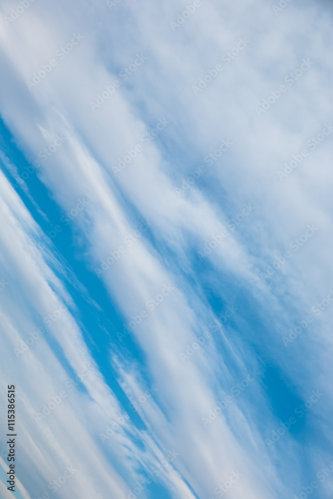 Wall mural abstract background with bokeh defocused beautiful flame clouds in the sky