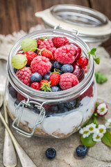 Tasty muesli with yogurt and berry fruits