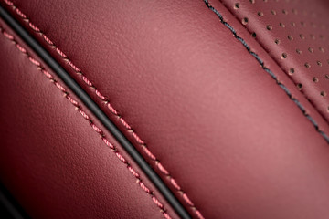 Car leather background with stitch. Interior detail.
