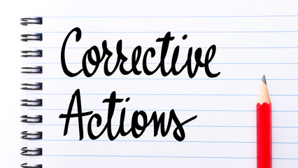 Corrective Actions written on notebook page
