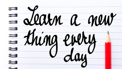 Obraz premium Learn A New Thing Every Day written on notebook