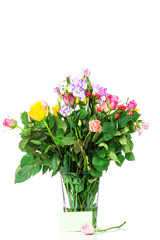Bouquet of mixed flowers in the vase on white background