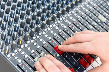 Professional mixing console in studio
