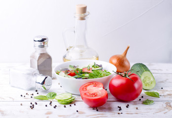 Salad. Tomatoes, cucumbers and onion.