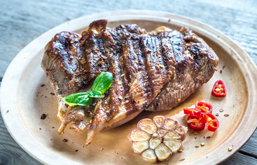 Grilled turkey on the wooden board