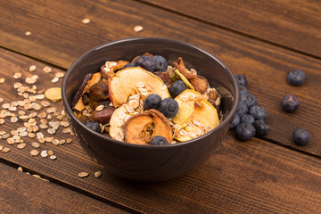 good breakfast, Organic Breakfast Quinoa with Nuts Milk and Berries, Breakfast oatmeal porridge with cinnamon, cranberries and blueberries, , selective focus, close up, front view