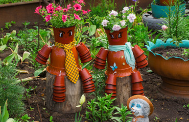 decoration for garden, pot puppets with flowers