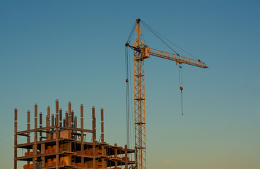 Construction crane in evening