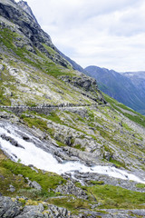 Fototapeta na wymiar The Trollstigen road between the mountains, Norway. The most winding and dangerous road in Europe.