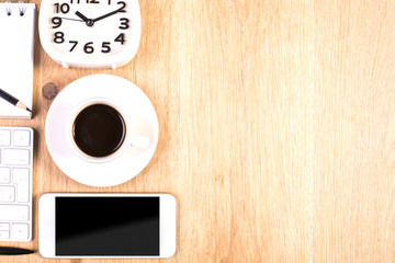 Desk with coffee and phone