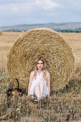 Naklejka na ściany i meble blonde in the hay
