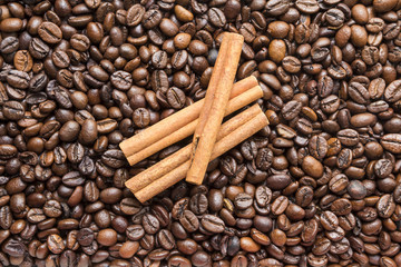 cinnamon sticks and coffee beans background