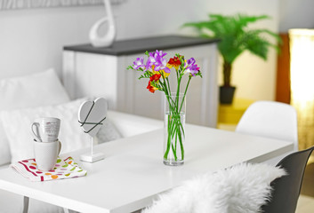 Beautiful comfortable modern interior with table and chairs