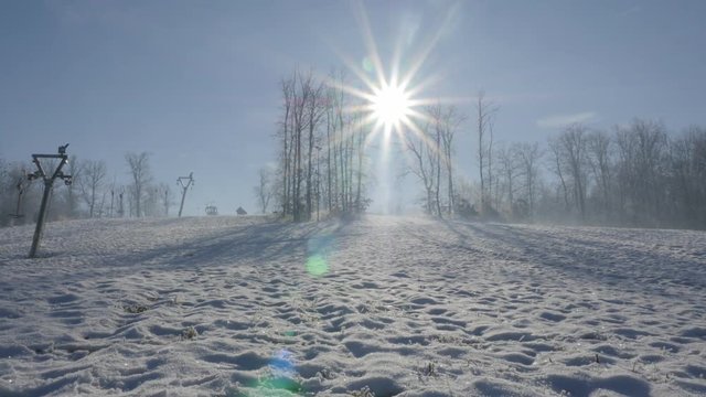 Modern ski complex and ropeway above town of Zajecar in Eastern Serbia 4K 3840X2160 UHD video - Winter time on the snowed ski slopes at early morning 4K 2160p UHD panning footage 