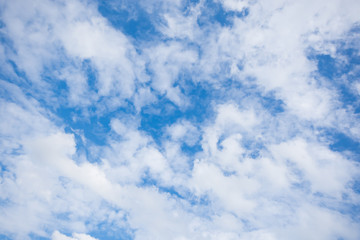 The blue sky with white cloud as background