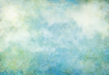 Cloud Grunge Earth.  A textured background with turquoise, yellow and green grunge patterns overlaid with fog and clouds.  Image displays a pleasing paper grain at 100 percent.