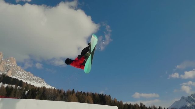 snowboard slow motion,snowboarder jumping backflip