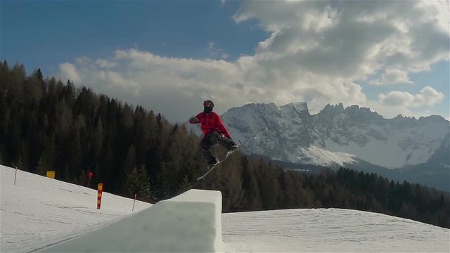 super slow motion of snowboarder jumping backflip