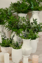 closeup flowers and candles wedding decorations