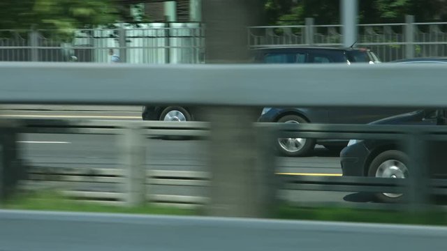 Fast moving cars on the highway