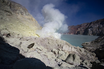 Sulfur mine with workers in Kawah Ijen, Java, Indonesia