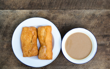 Cooffee in bowl with fried Bread Thai country style traditional