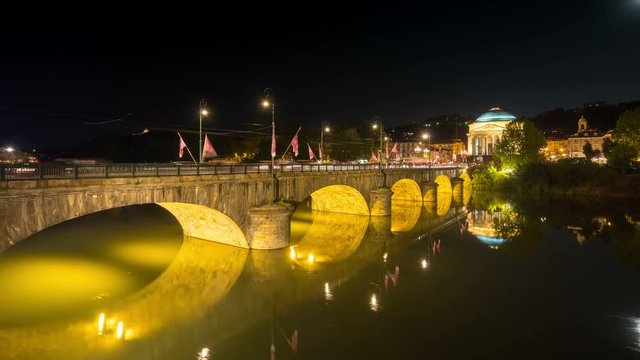 traffic time lapse over vittorio emanuele bridge turin great mother of god gran madre di dio church in the background
