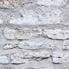 Fragment of an old brick wall