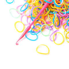 Fototapeta premium Pile of multiple loom bands isolated