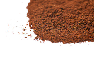 Pile of the ground coffee flakes isolated