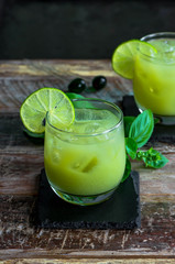 Iced green tea cocktail with tequila and lemon