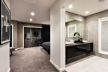 Modern washroom and hallway to a another room