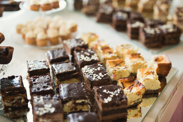 Different kinds of baked sweets on a buffet