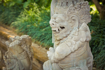 Fototapeta na wymiar statue at the entrance to the temple, Bali, Indonesia