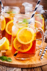 ice tea with slice of lemon in mason jar