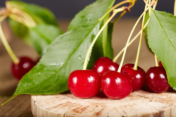 Cherries on wooden table