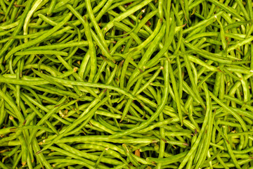 Green beans close up top view. Food background.