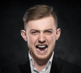 Angry businessman shouting.