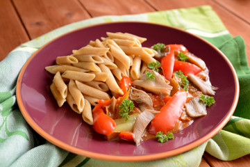 Stewed oyster mushrooms with peppers and whole wheat pasta