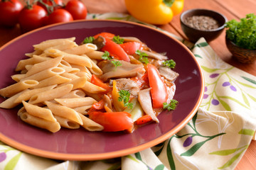 Stewed oyster mushrooms with peppers and whole wheat pasta