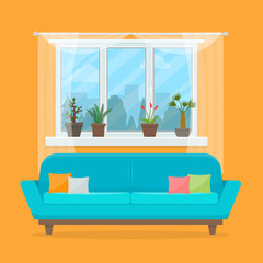 Sofa with pillows and window