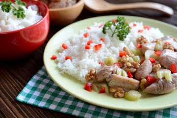 Roasted chicken meat with stalk celery, roasted walnuts and rice