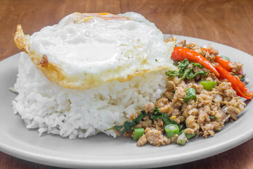 Rice topped with stir fried minced pork and basil. Thai food