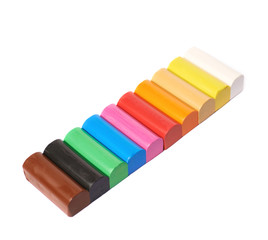 Sticks of colorful plasticine isolated